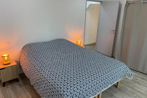 Postel nebo postele na pokoji v ubytování La parenthèse