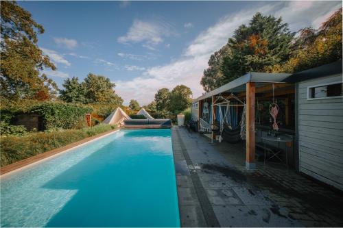 Gallery image of Vakantievilla met zwembad, wellness en glamping in Paal/Beringen in Beringen