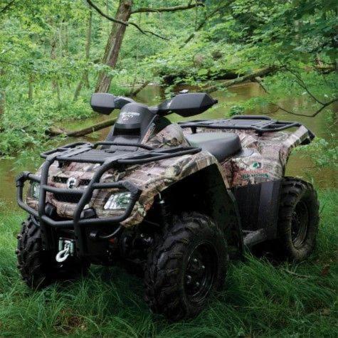 a four wheeled vehicle parked in the grass at Camp Beluan Ceria 