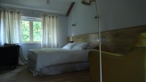 Cama o camas de una habitación en The Kingsley at Eversley
