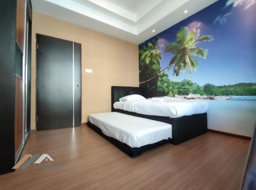 two beds in a room with a painting on the wall at Serene Heights by Evernent in Miri