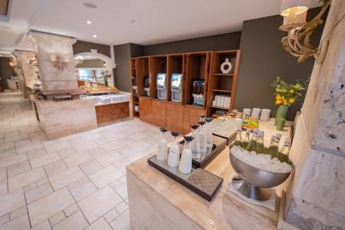 a large bathroom with a sink and a counter at Maritim Antonine Hotel & Spa in Mellieħa