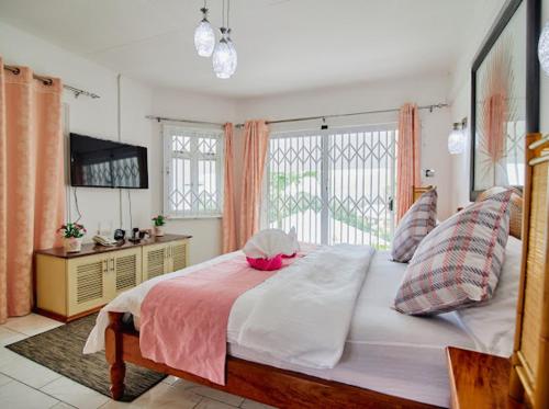 Ένα ή περισσότερα κρεβάτια σε δωμάτιο στο 360 Degrees Villa