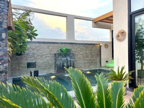 an image of a house with a swimming pool at Villa Bali Jeddah in Jeddah