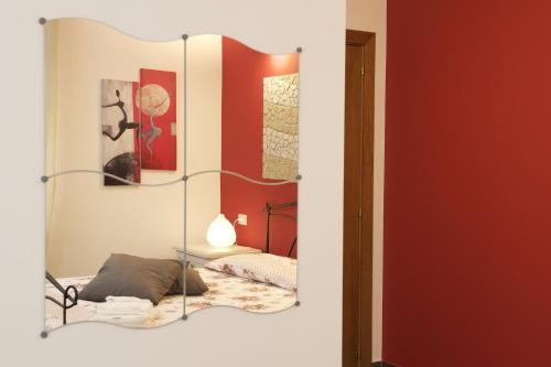 Cama o camas de una habitación en B&b La Casa Del Nonno