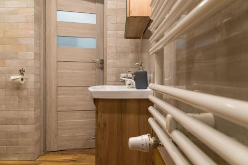 Koupelna v ubytování VacationClub – Bukowa 17A Apartament E.1