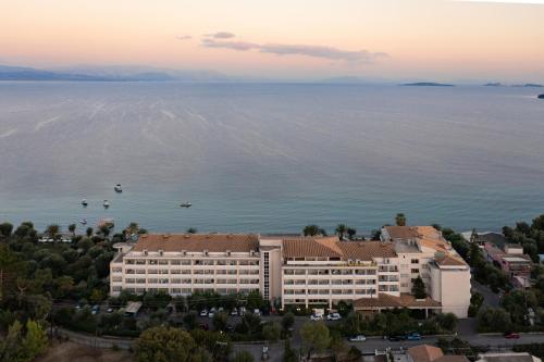 an aerial view of a hotel on the water at Elea Beach Hotel in Dassia