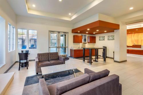 a living room with a couch and a table at Hilton Vacation Club Desert Retreat Las Vegas in Las Vegas