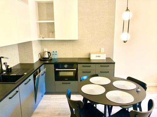 Dapur atau dapur kecil di e-baltic - Niechorze, Your beachfront apartments,