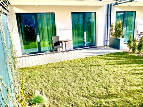 Taman di luar e-baltic - Niechorze, Your beachfront apartments,