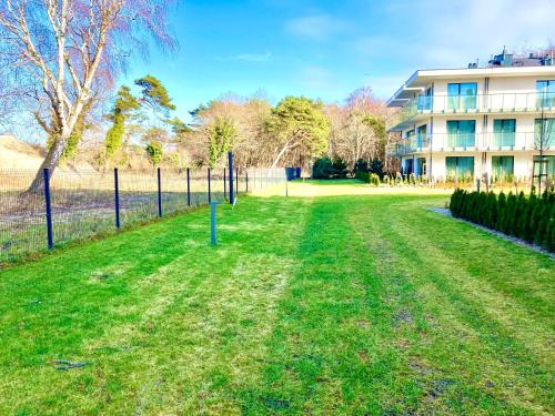 Taman di luar e-baltic - Niechorze, Your beachfront apartments,