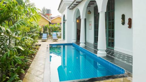 Φωτογραφία από το άλμπουμ του LohonoStays Maison9 Estate 6 Bedroom σε Vagator