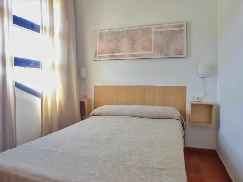 Säng eller sängar i ett rum på Ático con vistas Monte Gorbea