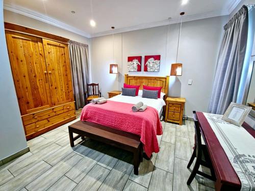 Postel nebo postele na pokoji v ubytování 2 Owls Guesthouse