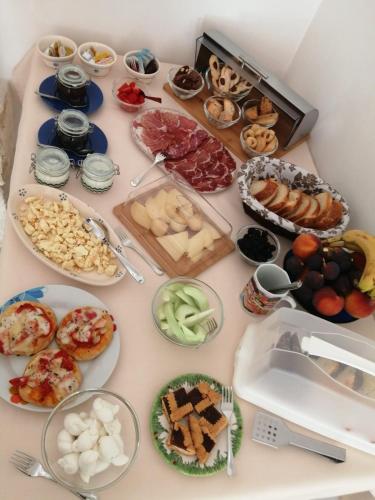 a table topped with lots of different types of food at Masseria Dirupo in Noci