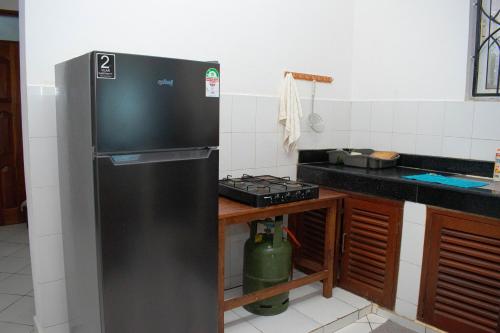 皇家棕櫚瓦帕公寓廚房或簡易廚房