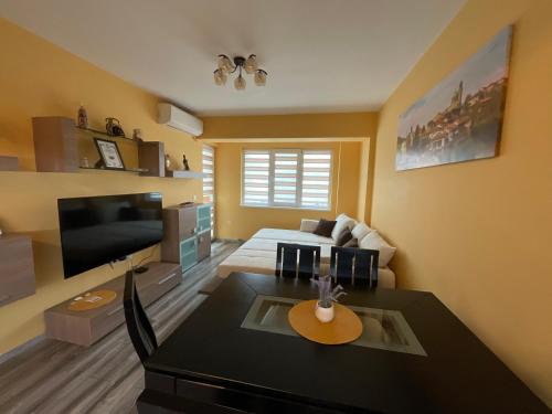 TV a/nebo společenská místnost v ubytování Nataly Homes