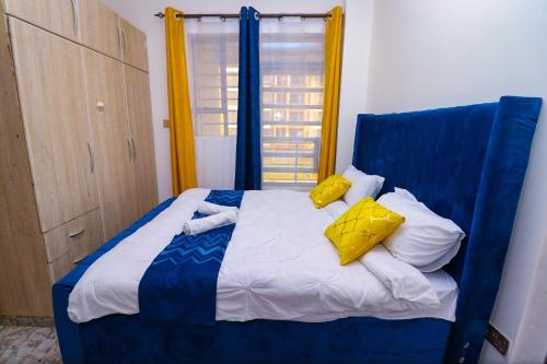 Krevet ili kreveti u jedinici u okviru objekta The West Residence-Bluebird