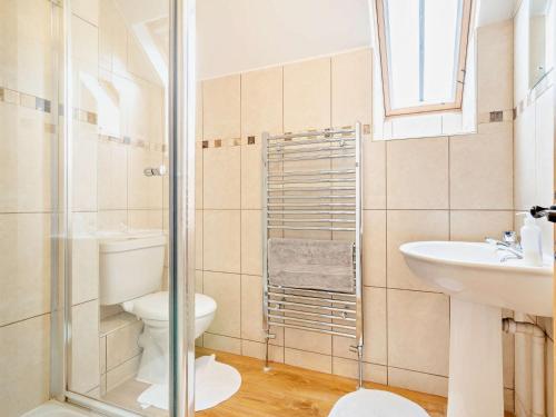 a bathroom with a toilet and a sink at 1 bed property in Tretower Brecon Beacons BN126 in Tretower