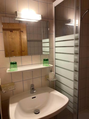 Salle de bains dans l'établissement Hotel Aquamarin