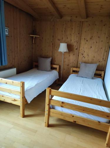 Un ou plusieurs lits dans un hébergement de l'établissement Hotel Aquamarin