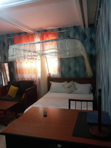 Letto o letti a castello in una camera di Grayphix Airbnb Mtwapa