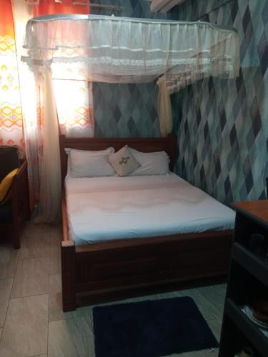 Letto o letti in una camera di Grayphix Airbnb Mtwapa