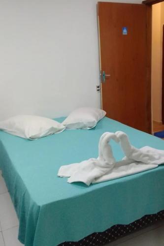 Ένα ή περισσότερα κρεβάτια σε δωμάτιο στο Pousada Tô na Praia! - Cabo Branco