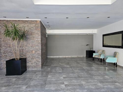 Μια τηλεόραση ή/και κέντρο ψυχαγωγίας στο Alojamiento MAR