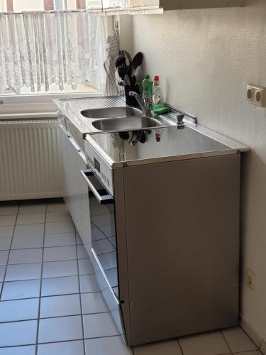 Dapur atau dapur kecil di gemütliche Gäste Suite im Herzen von Neumünster