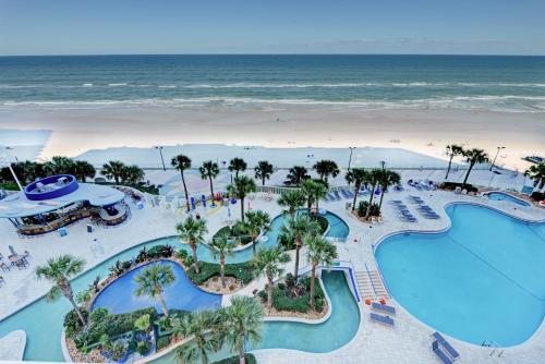 an aerial view of the pool and beach at a resort at Wyndhams Ocean Walk Resort in Daytona Beach