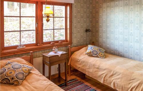 Ένα ή περισσότερα κρεβάτια σε δωμάτιο στο 2 Bedroom Stunning Home In Vrnamo