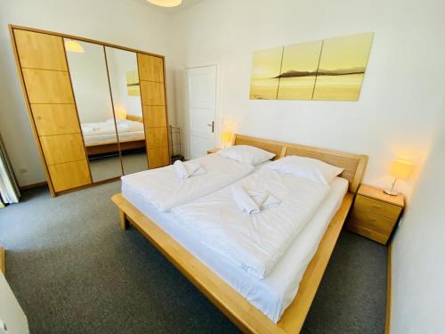 Postel nebo postele na pokoji v ubytování Villa Diana/Perle