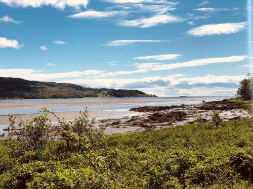 a view of the beach from the shoreline at The Lodge in Lochgilphead