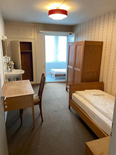 Ein Bett oder Betten in einem Zimmer der Unterkunft Hotel National