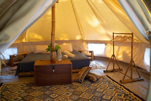 Lote 10 Tayrona Glampingにあるベッド