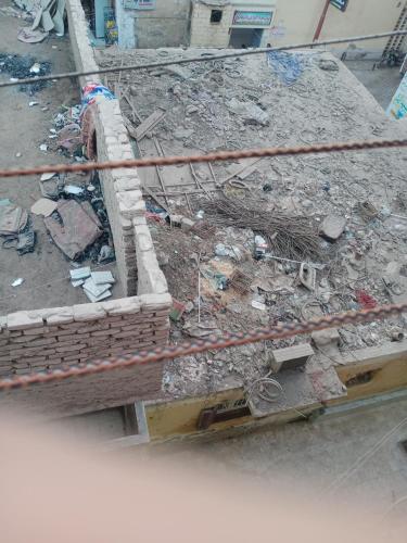 a pile of rubble and debris on a construction site at المنيا سمالوط 