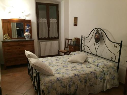 En eller flere senger på et rom på Casa di Emanuela