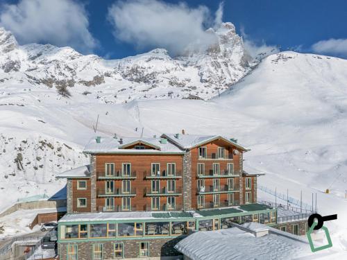 HOTIDAY Room Collection - Cervinia v zimě
