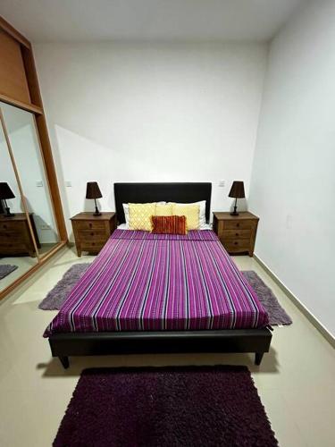 Кровать или кровати в номере Modern Apartment in Praia Baixo - 1 min Walking to Beach