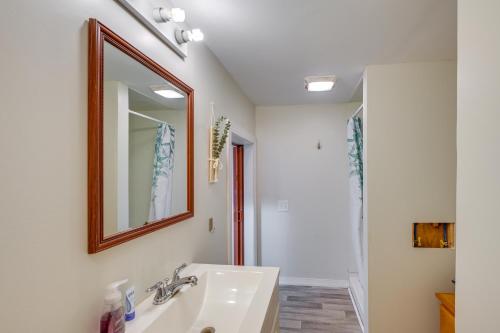 a bathroom with a sink and a mirror at Glenburn Studio about 9 Mi to Lakeside Landing Park! in West Glenburn