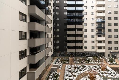 an aerial view of a courtyard in a building at Cozy Studios in Pipera Business Area - Where Style Meets Functionality in Voluntari