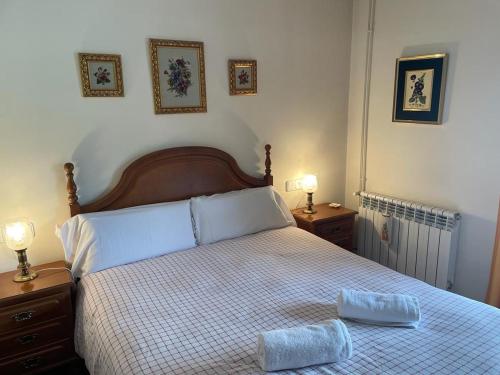 Кровать или кровати в номере Bonito apartamento Incles by Renttarter