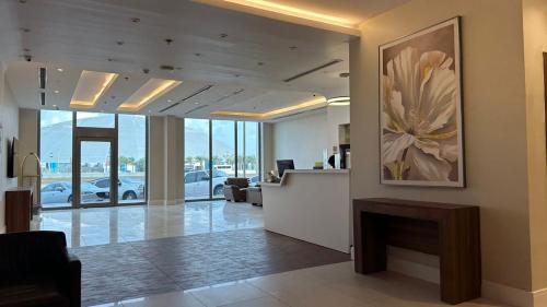 TV o dispositivi per l'intrattenimento presso Quiet Dreams - Serviced Apartments Al-Nour Branch