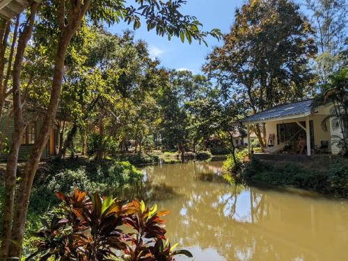 a house with a river in front of it at The River Retreat Koh Mak in Ko Mak