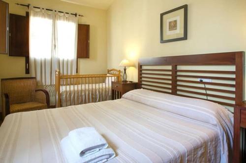 En eller flere senge i et værelse på CT 220 - Sueño Rural - Rivero de Posadas