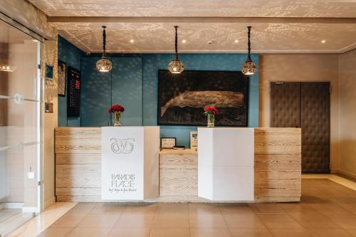 a room with a counter with flowers on it at Paradis Plage Surf Yoga & Spa in Taghazout