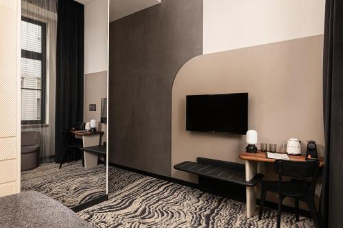 TV o dispositivi per l'intrattenimento presso Hotel GIN Budapest