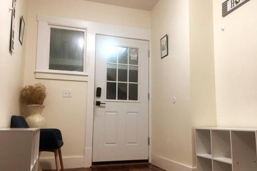a white door in a room with a window at Comfy 4 Bed 1 Bath with Wi-fi in College Area in Springfield