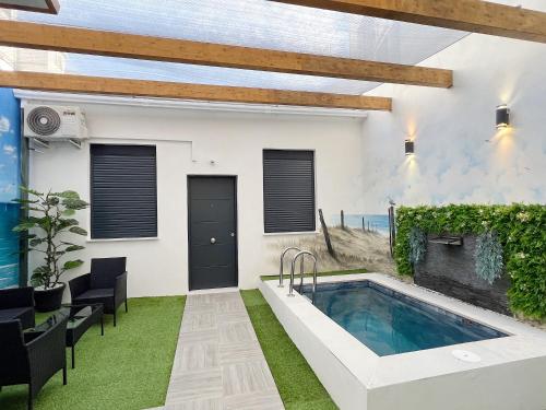 Πισίνα στο ή κοντά στο Apartamento en la Gran Manzana